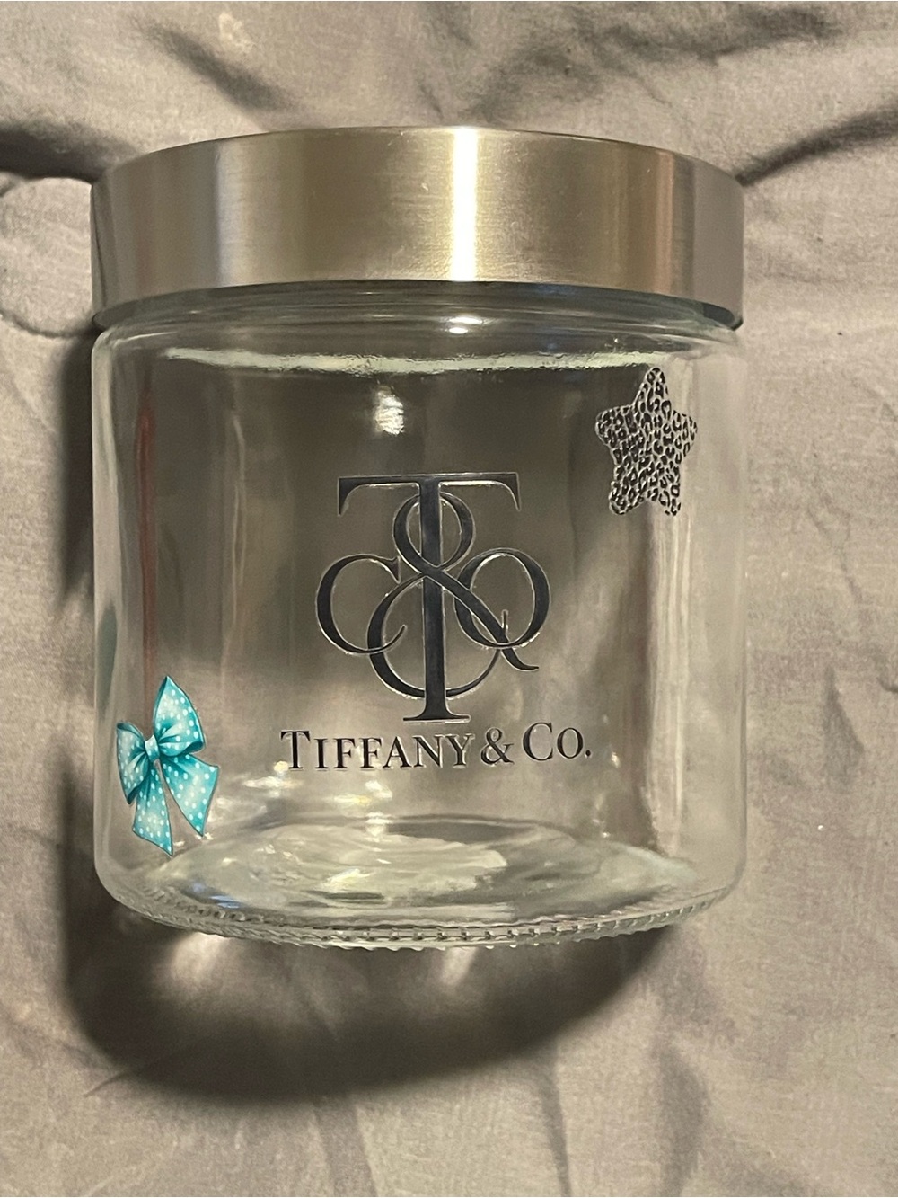 Decaled Small Clear Glass Canister with Silver Lid - Blue and Black Accents